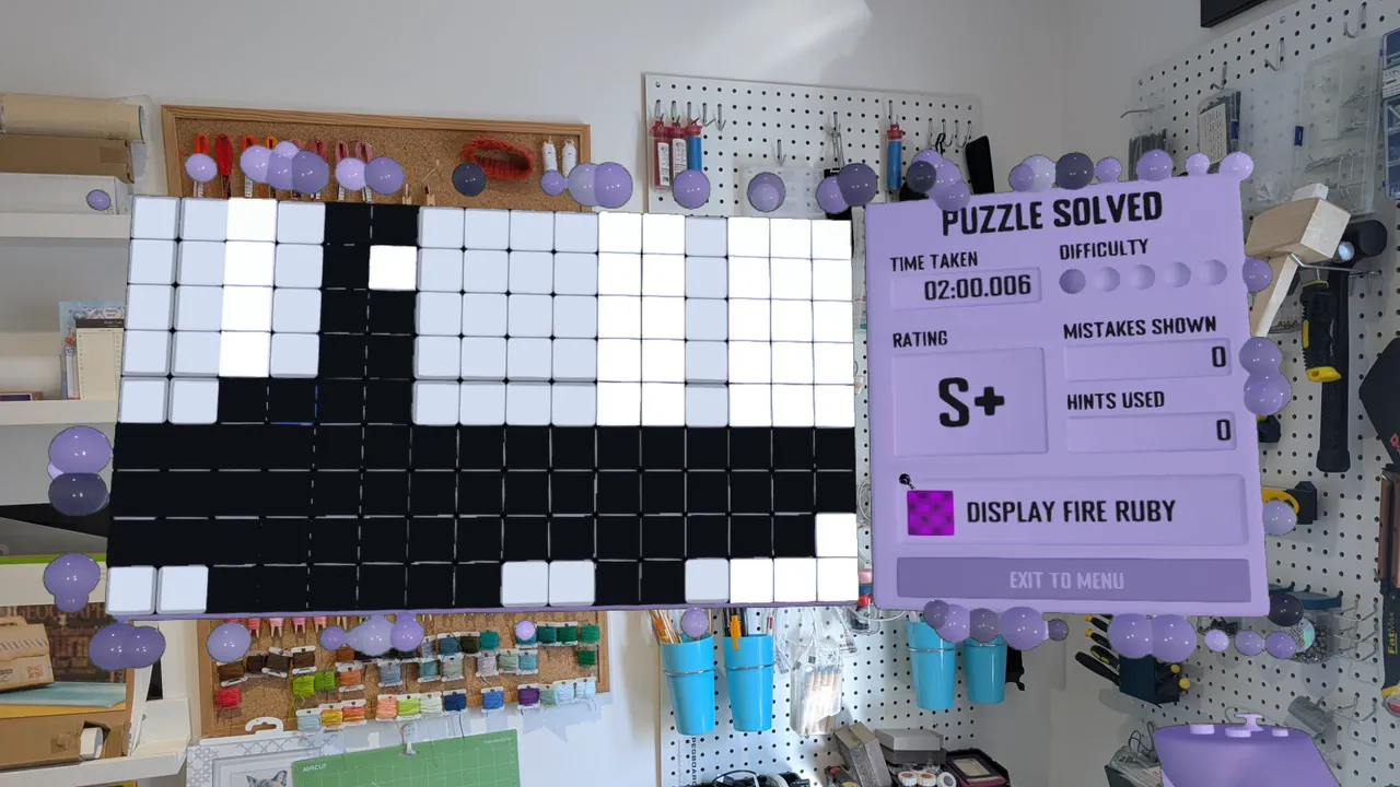 The Puzzle Solved panel after a nonogram: time taken, difficulty, mistakes shown, hints used and an S+ rating.